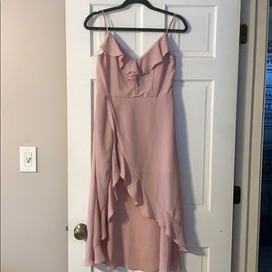 Light pink socialite romper. Size M never worn.